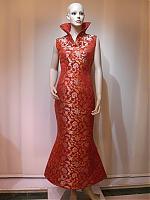 The Bright Dress for The Bride With Rolling Grass Patterns on Red Background