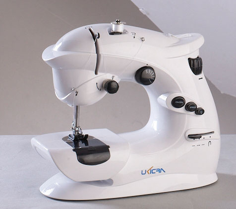 Mini Sewing Machine With 7 Built-in Patterns and Additional Reverse Function (WN-403) 