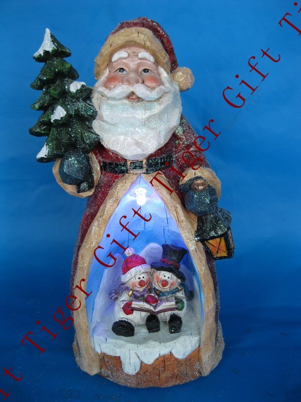 Polyresin Xmas Santa with Snowman Reading W/LED Light and Music