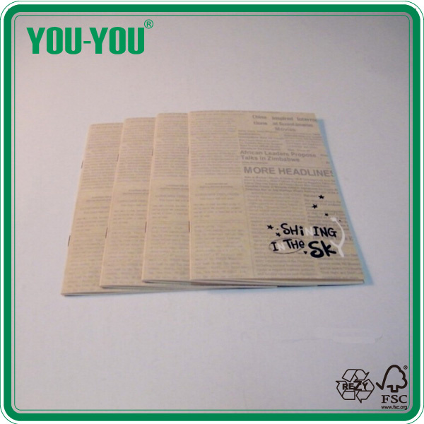 Newspaper Notebooks with Stapled Binding