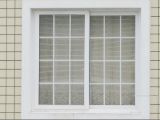 Cheap PVC Sliding Colored Glass Windows with Grills Design Price