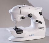 Mini Sewing Machine With 7 Built-in Patterns and Additional Reverse Function (WN-403) 