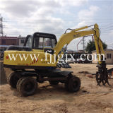 6 Tons Hydraulic Double Drive Wheel Excavating Machinery with Wood, Stone, Sugarcane Clamp Jg-608s