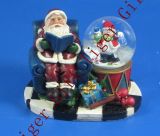 Polyresin Xmas Santa on Chair with Snowman Snowglobe 45mm