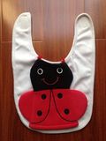 Manufacturer of Cotton Jersey Baby Bib with Terry Cartoon Cat Feeding Bottle Holder